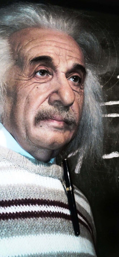 Portrait wallpaper of Albert Einstein with thoughtful expression and signature wild hair for science fans