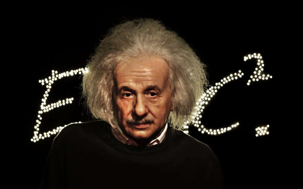 Albert Einstein portrait wallpaper with iconic hairstyle intense gaze and glowing E equals mc squared background