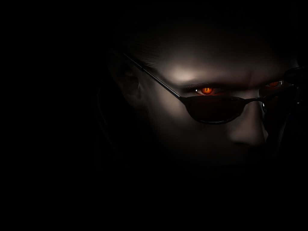 Albert Wesker Resident Evil wallpaper intense gaze sunglasses dark shadowy background
