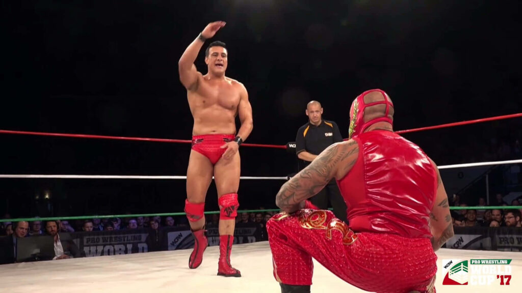 Alberto Del Rio vs Rey Mysterio intense wrestling match showcasing signature styles wallpaper
