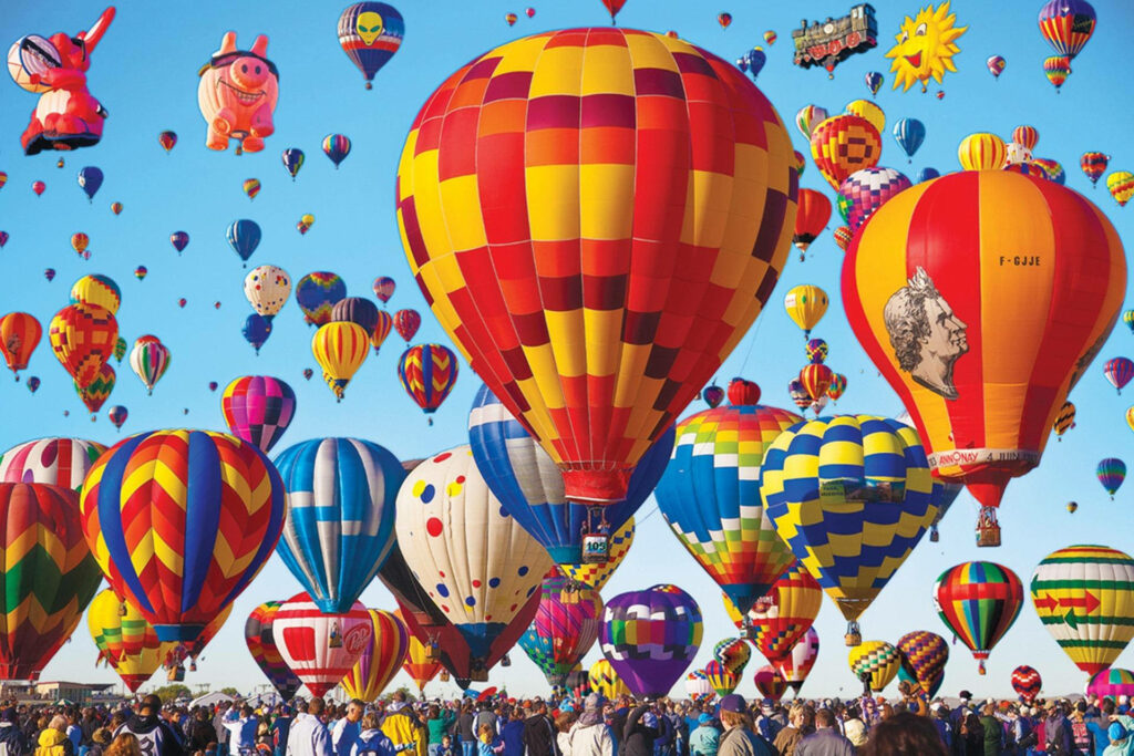 Colorful Albuquerque Skies: A Captivating Hot Air Balloon Spectacle Wallpaper