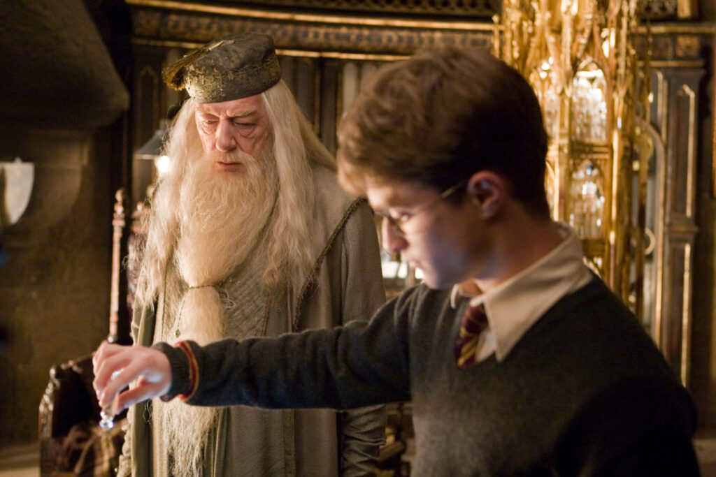 Albus Dumbledore with white beard in magical setting perfect for Harry Potter wallpaper background