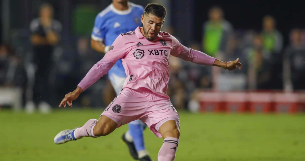 Alejandro Pozuelo Inter Miami in pink kit about to strike ball during football match wallpaper