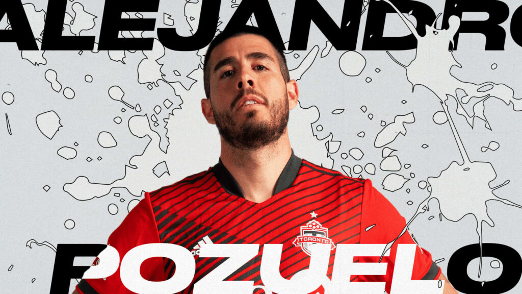 Toronto FC midfielder Alejandro Pozuelo in red kit with bold graphic background and name design Wallpaper