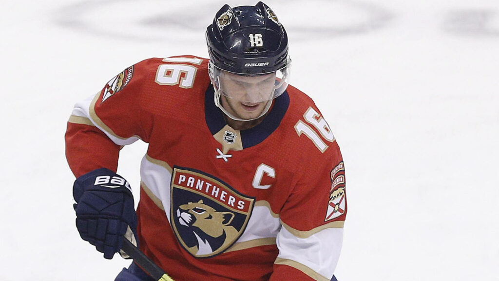 Florida Panthers captain Aleksander Barkov intense action against Ottawa Senators hockey game wallpaper