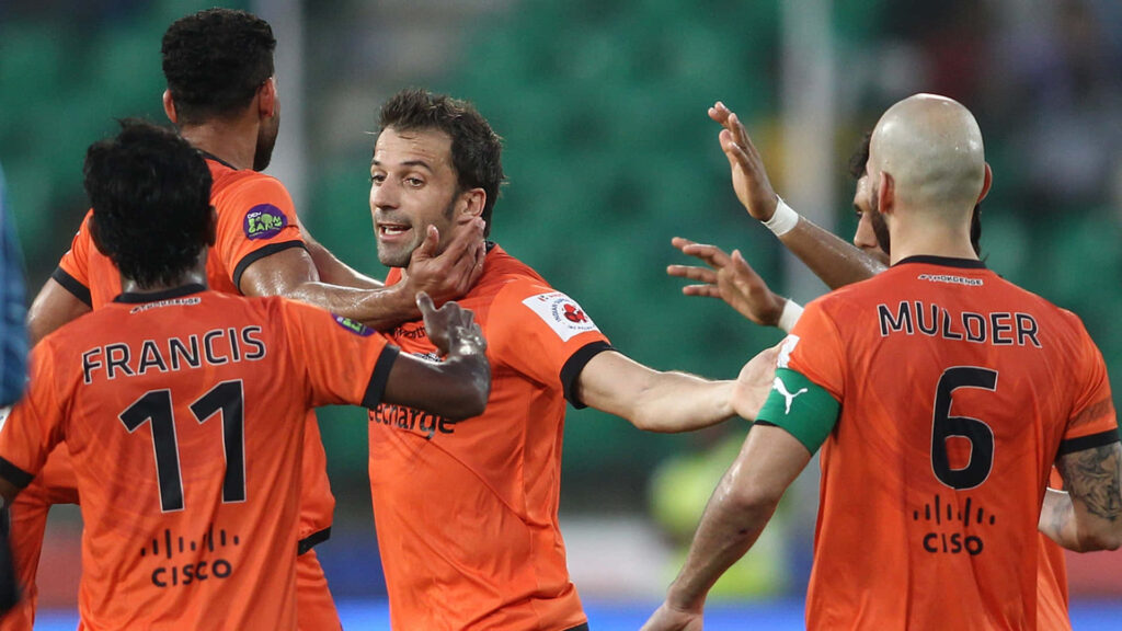 Alessandro Del Piero celebrates with Delhi Dynamos teammates showing passion and teamwork Wallpaper