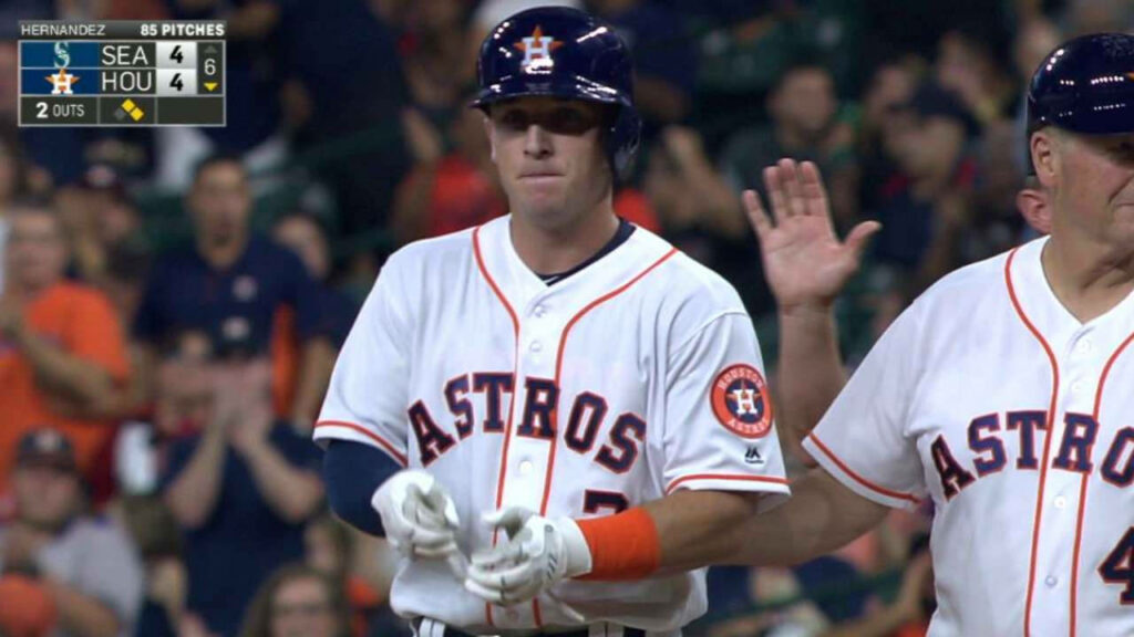 Alex Bregman in Houston Astros uniform on field with scoreboard showing tied Astros Mariners score Wallpaper