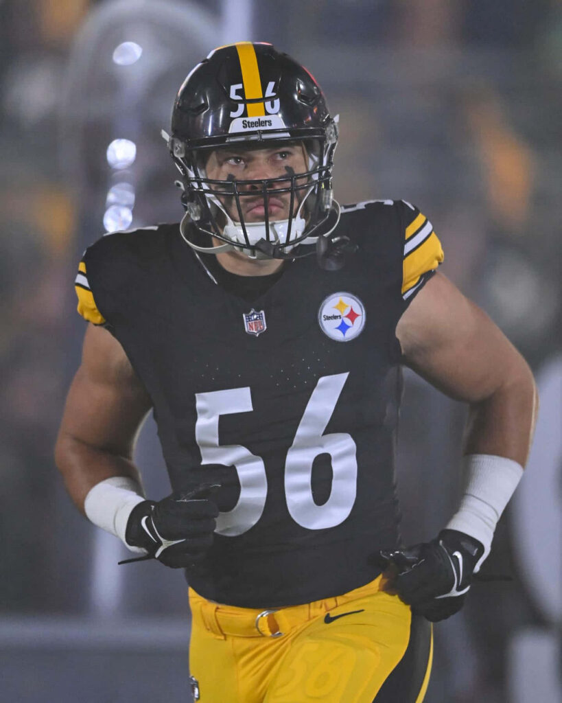 Pittsburgh Steelers linebacker Alex Highsmith number 56 in action during intense football game Wallpaper