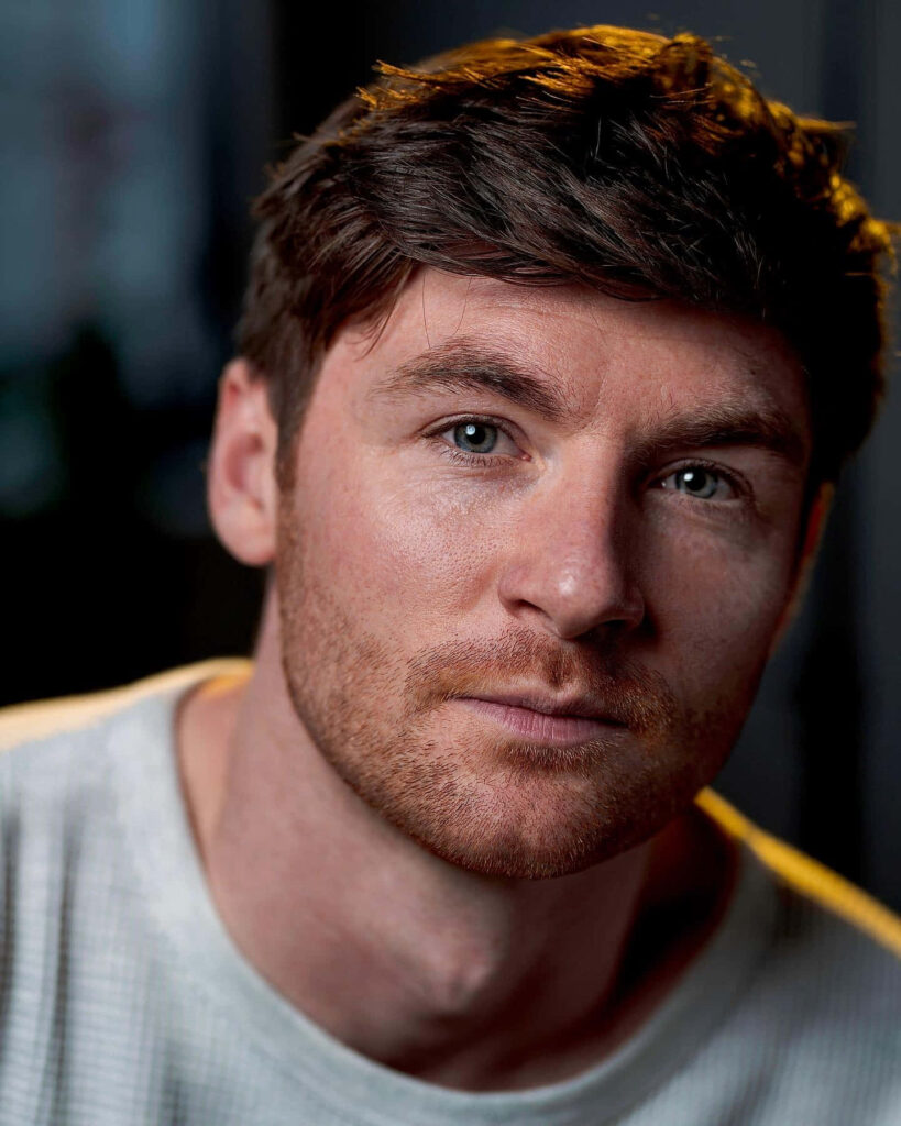 Portrait of Alex Mason with intense blue eyes rugged features heroic game protagonist wallpaper