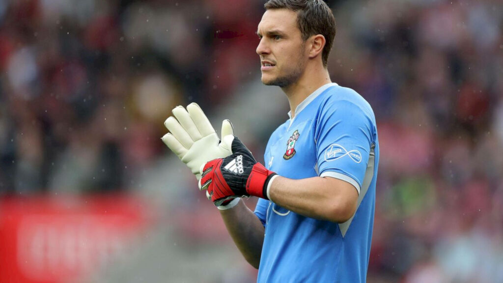 Alex McCarthy in Southampton goalkeeper kit and gloves focused preparing for match action wallpaper