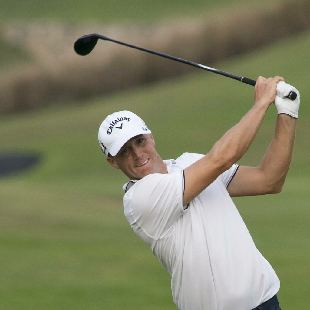 Alex Norén golf swing perfect form on lush green course showcasing focus and athletic skill wallpaper