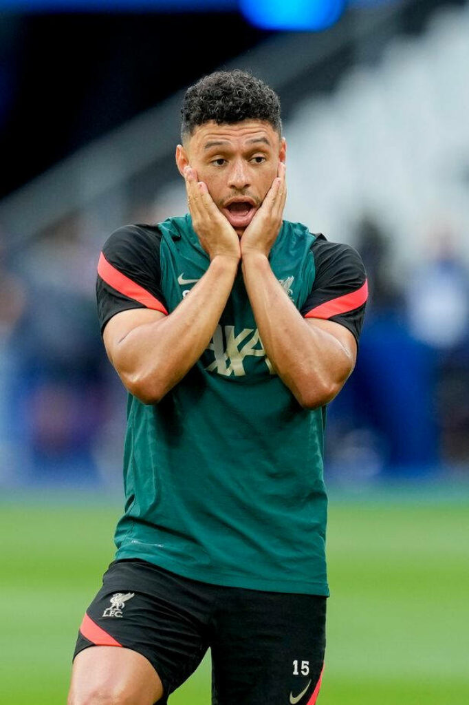 Alex Oxlade-Chamberlain showing surprise with hands on face during football training session wallpaper