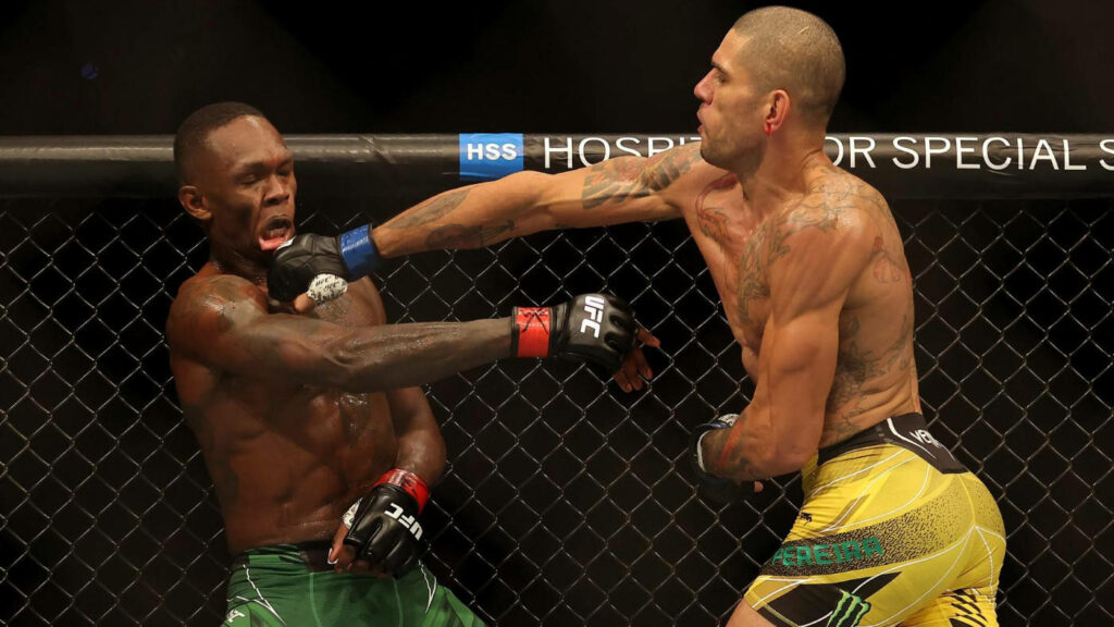 Alex Pereira lands a strong punch on opponent in intense MMA fight dynamic wallpaper background