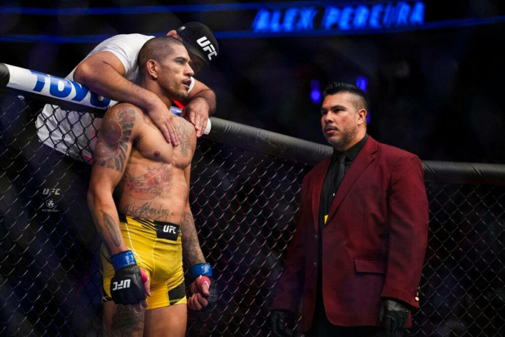 Alex Pereira in UFC corner receives coach support focused before fight wallpaper background