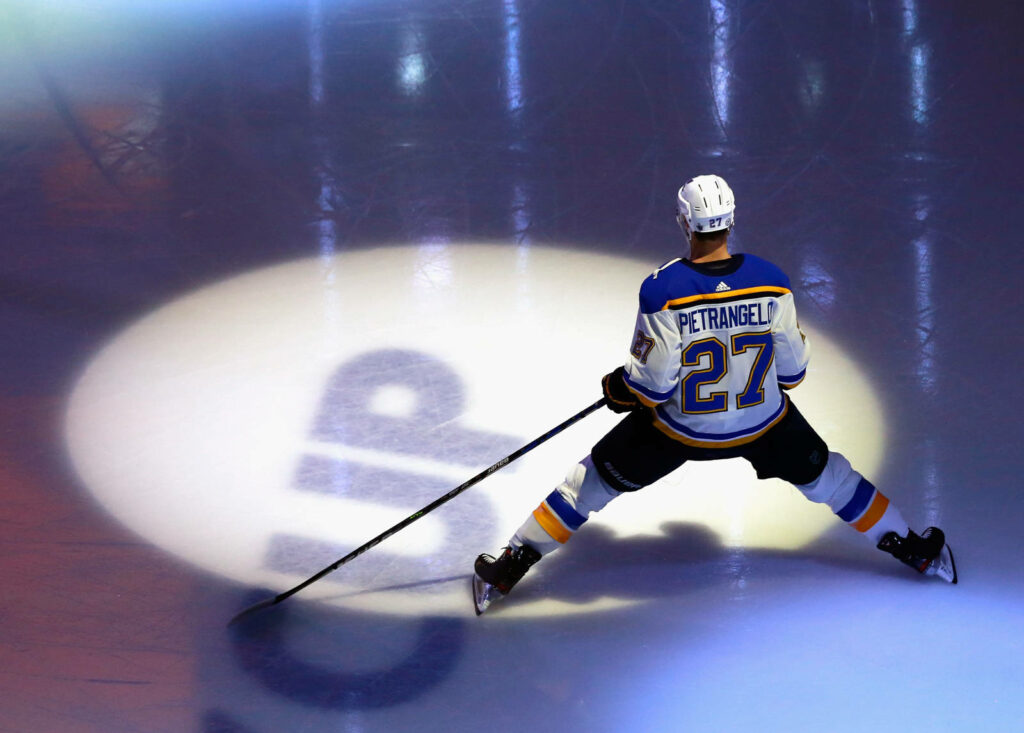 Alex Pietrangelo number 27 back view on ice preparing for game dramatic lighting wallpaper