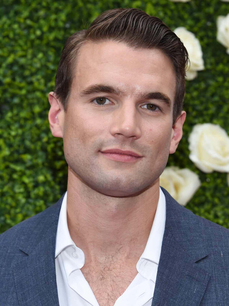 Alex Russell in sharp suit at event wallpaper background with fresh sophisticated style