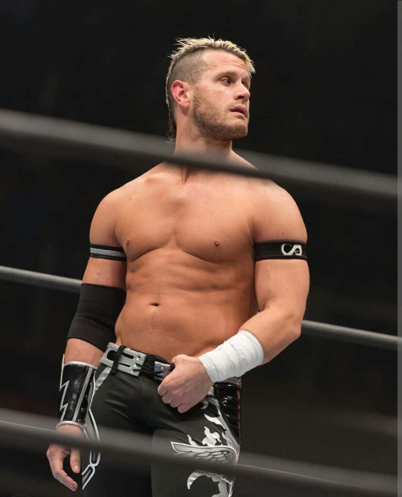 Alex Shelley in Impact Wrestling ring showing athletic build and intense focus wallpaper background