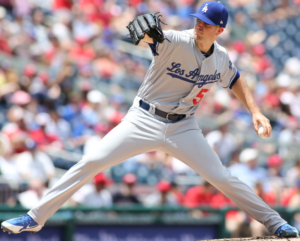 Alex Wood pitching for Los Angeles Dodgers in action on mound during baseball game wallpaper background