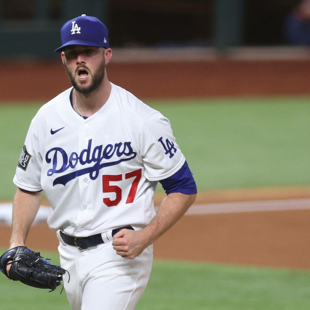 Alex Wood pitching intensely in Los Angeles Dodgers uniform dynamic candid baseball action wallpaper