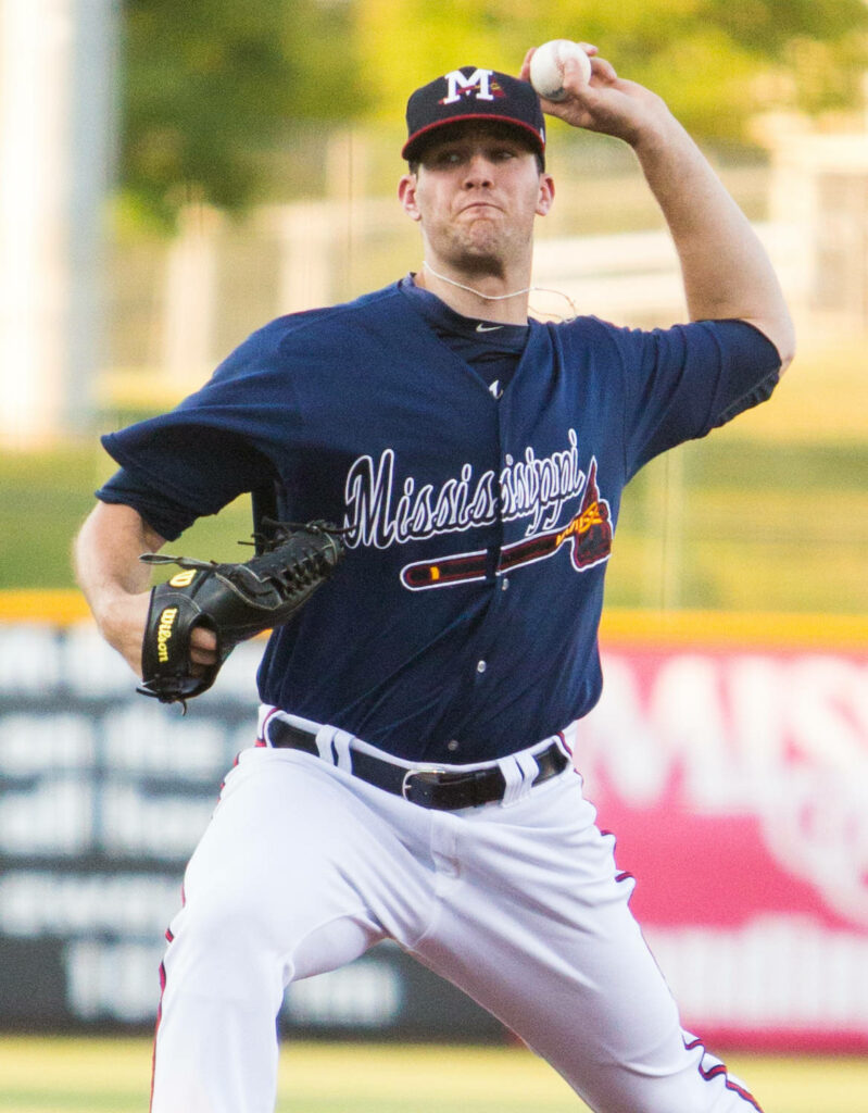 Alex Wood pitching for Mississippi Braves dynamic baseball wallpaper background in action