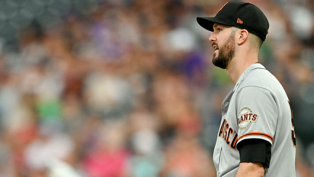 Alex Wood pitching in San Francisco Giants uniform during game baseball wallpaper background