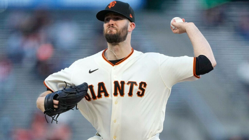 San Francisco Giants pitcher Alex Wood delivering a pitch in action on the mound wallpaper