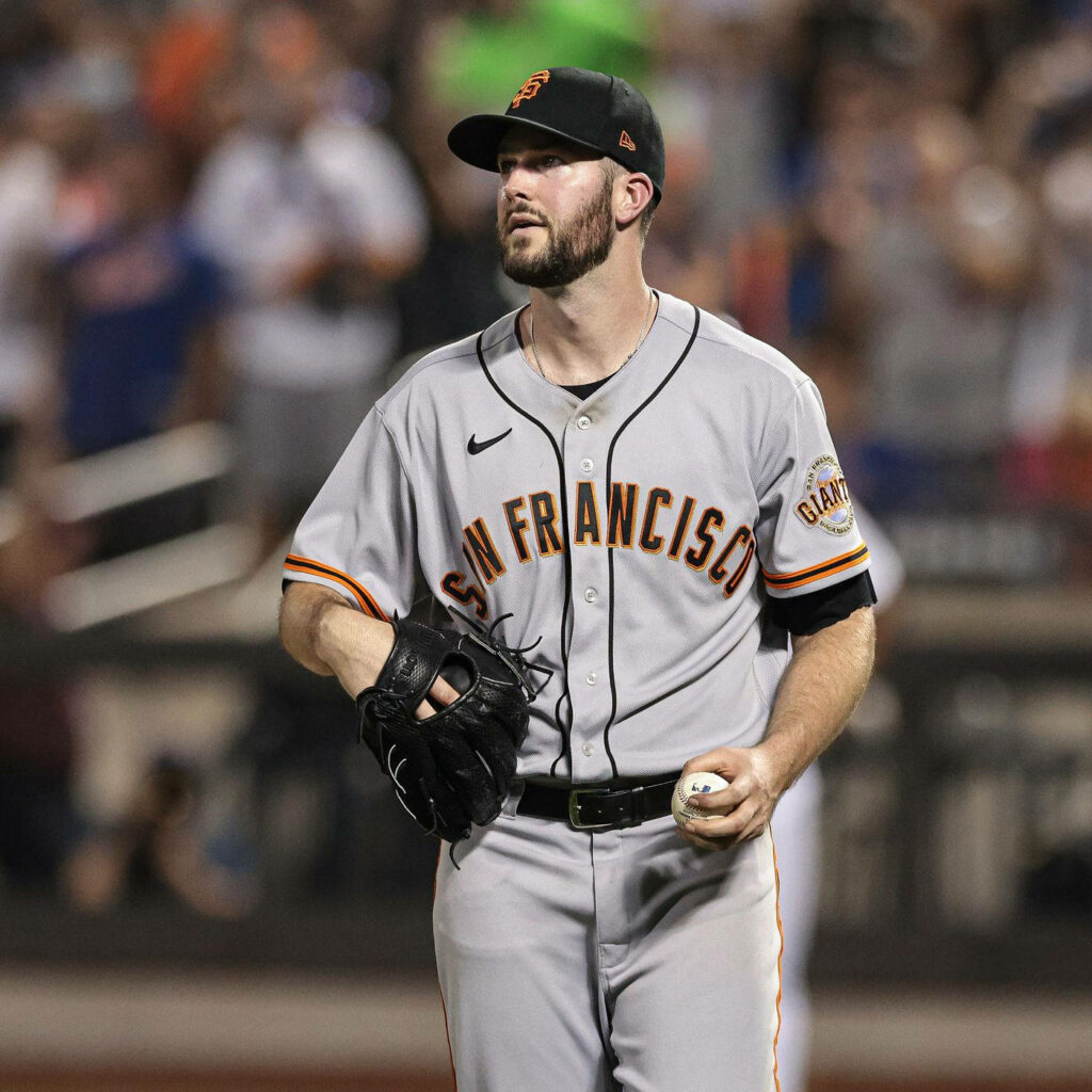 Alex Wood San Francisco Giants pitcher ready to throw baseball on field during game wallpaper
