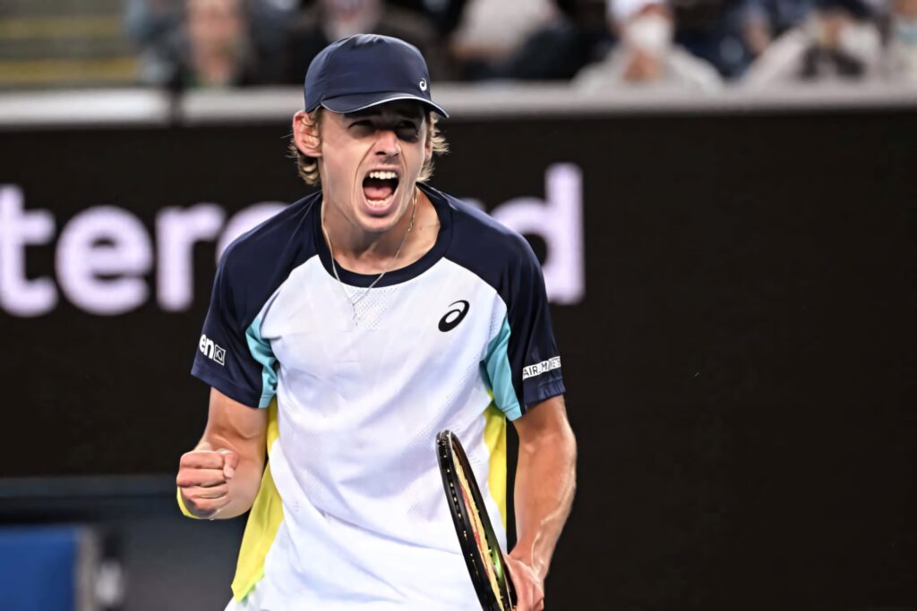 Alex de Minaur passionately celebrates on tennis court showing determination and competitive spirit Wallpaper