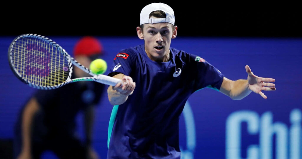 Alex de Minaur intense tennis match return athleticism determination wallpaper background