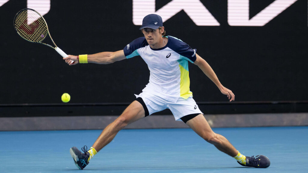 Alex de Minaur intense tennis action on court showcasing athleticism and focus wallpaper background