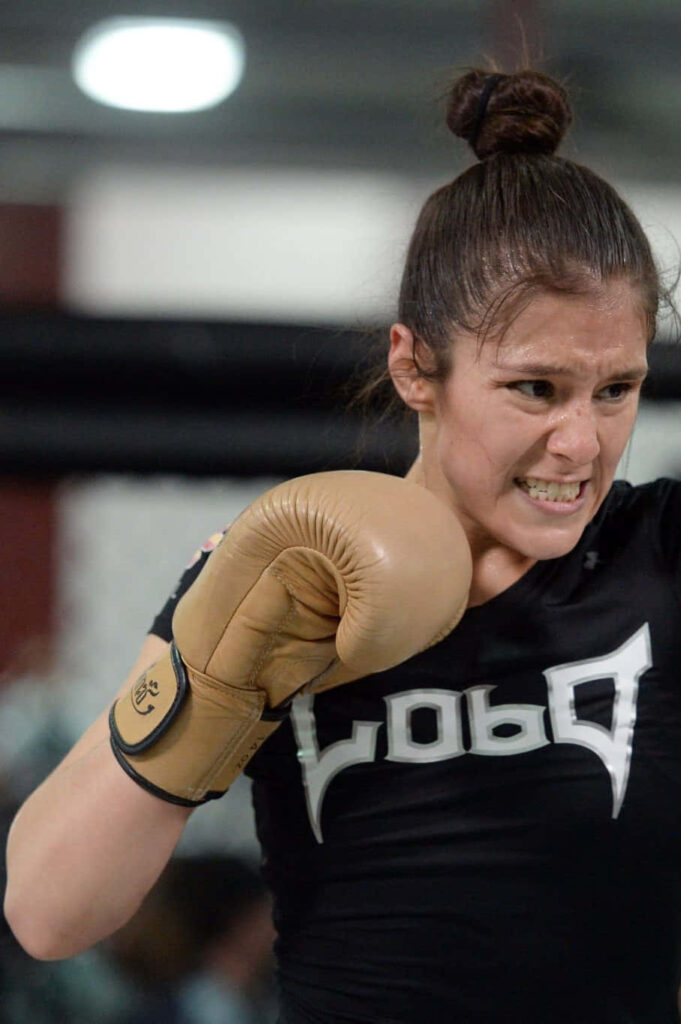 Alexa Grasso boxing training workout intense focus gym gloves ready for action wallpaper background