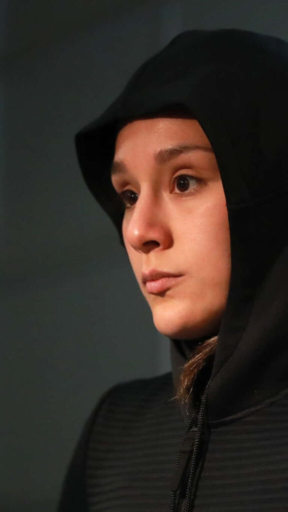 Alexa Grasso intense focused MMA fighter in black hoodie high quality wallpaper background