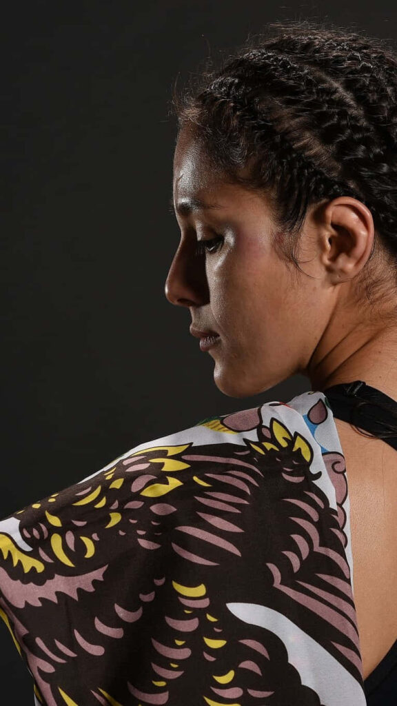 Alexa Grasso intense fighter portrait with braided hair dark background strength wallpaper