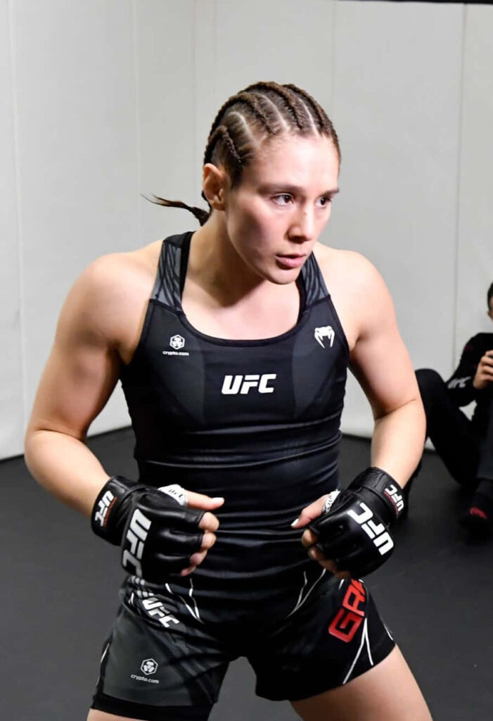 Alexa Grasso UFC fighter in fight gear showcasing focus determination and athleticism wallpaper