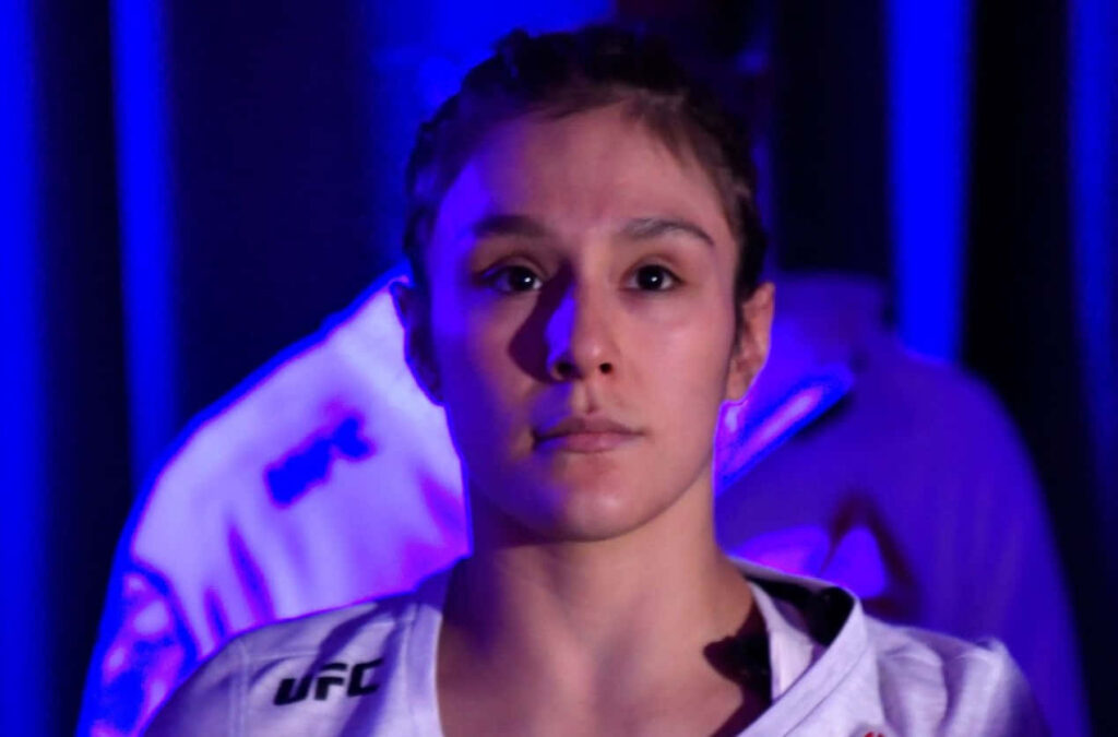 Alexa Grasso UFC fighter confident pose dramatic blue lighting wallpaper background