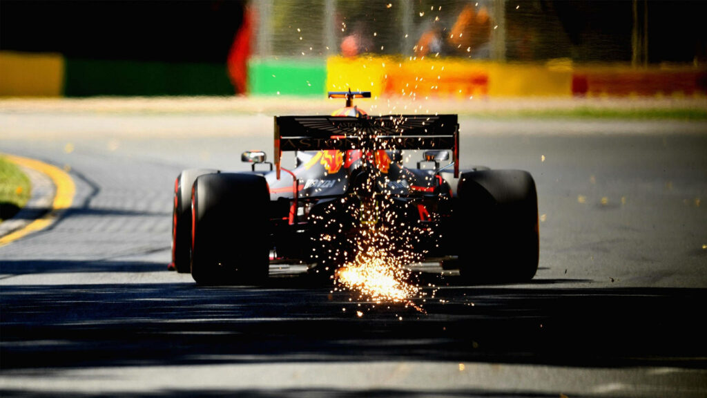 Alexander Albon in action on F1 track with sparks flying high speed motorsport excitement wallpaper
