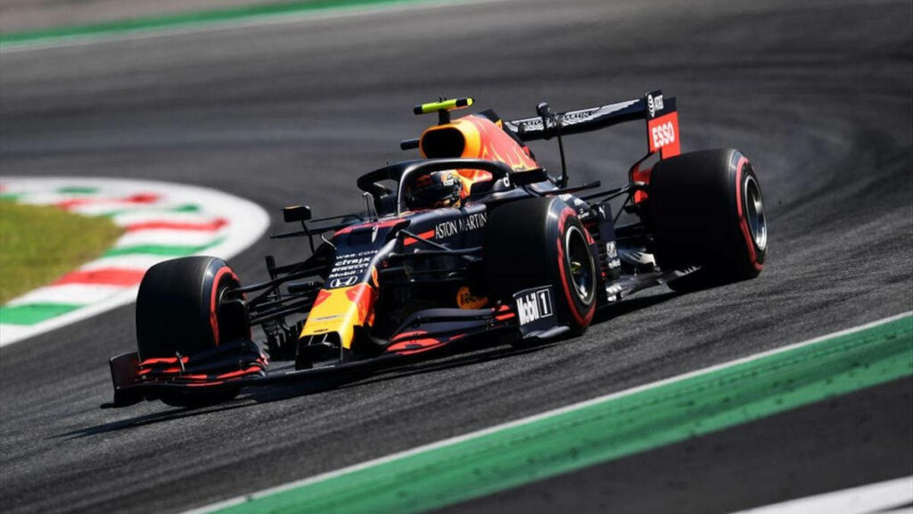 Alexander Albon racing in Red Bull F1 car high speed intense Formula 1 motorsport wallpaper