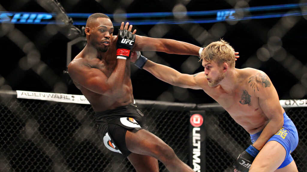 Alexander Gustafsson lands powerful punch on Jon Jones in intense UFC fight wallpaper background