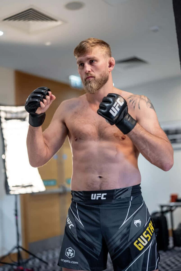 Alexander Gustafsson UFC fighter in focused fighting stance showcasing athletic physique wallpaper