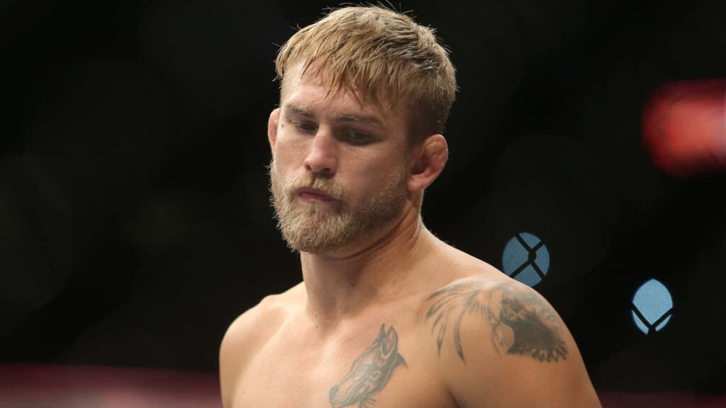 Alexander Gustafsson in UFC octagon showing focused stance and athletic MMA fighter physique wallpaper
