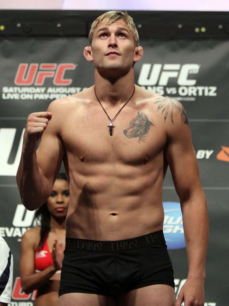 Alexander Gustafsson UFC weigh-in standing on scale showing athletic physique and focus Wallpaper