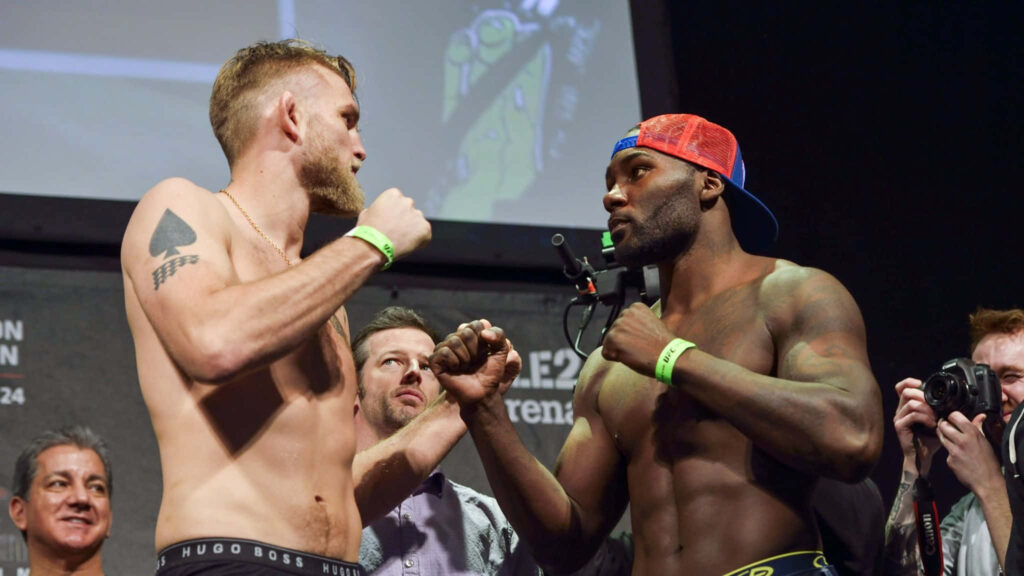 Alexander Gustafsson versus Anthony Johnson intense pre-fight stare down wallpaper background