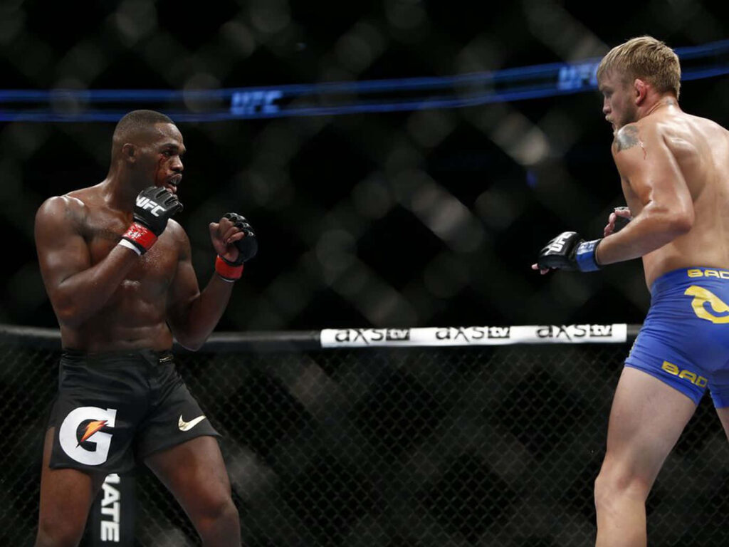 Alexander Gustafsson and Jon Jones face off in intense UFC fight inside octagon cage background Wallpaper