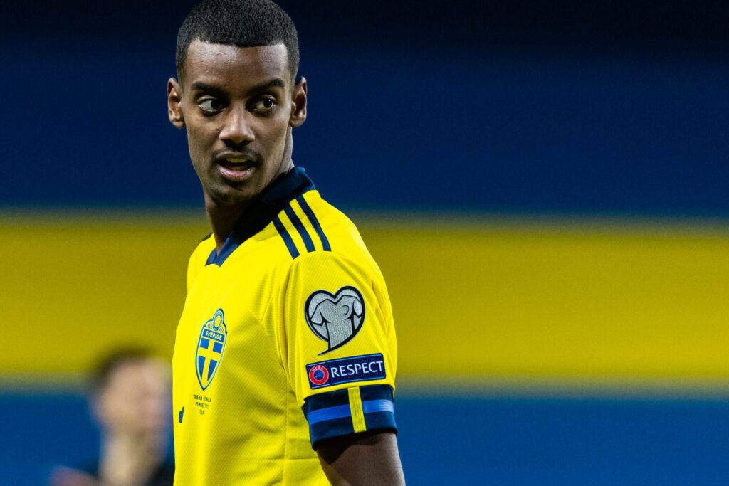 Alexander Isak in Swedish national team jersey focused during match side profile wallpaper
