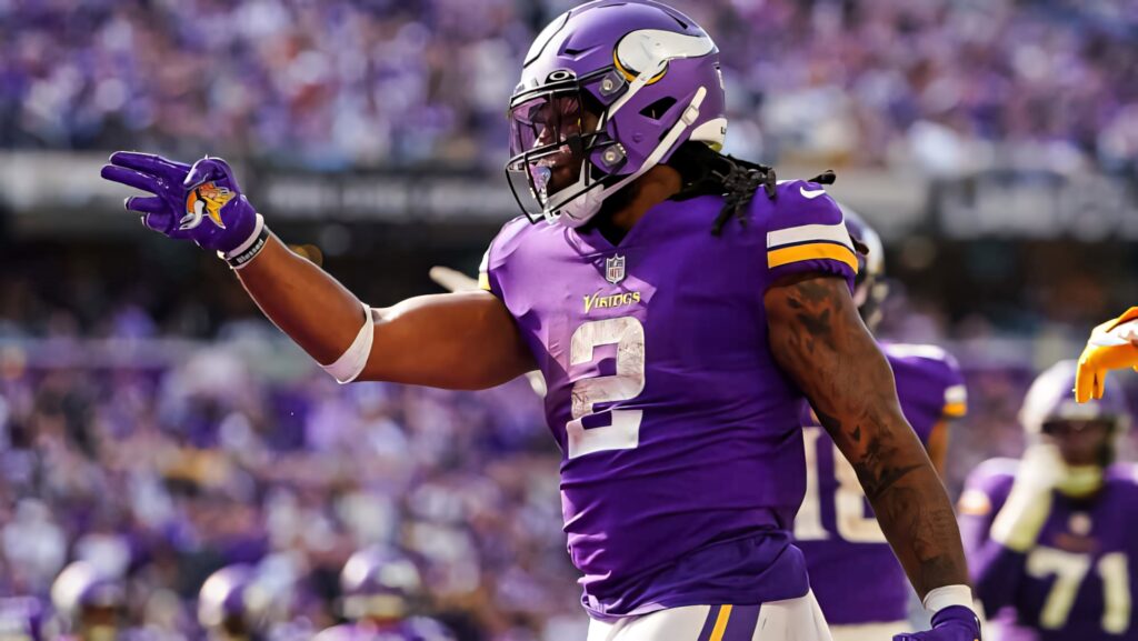 Alexander Mattison Minnesota Vikings celebrating energetic running back vibrant football wallpaper