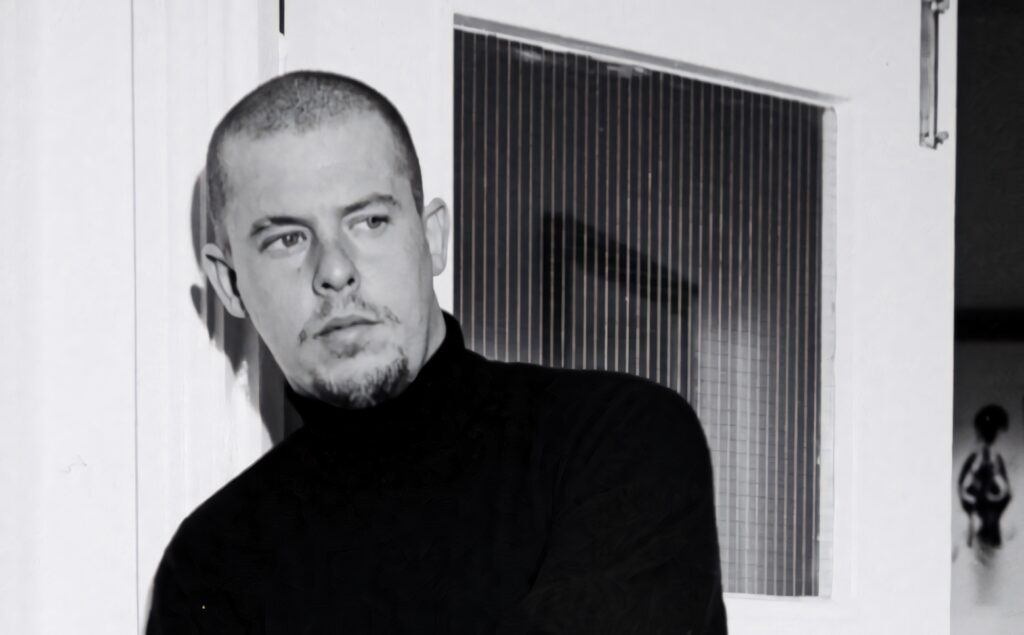 Alexander McQueen portrait wallpaper minimalist background iconic British fashion designer