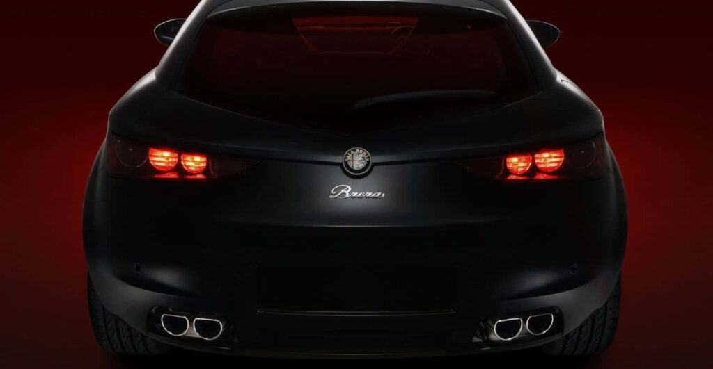 Alfa Romeo Brera rear view with distinctive taillights on sleek dark sporty wallpaper background