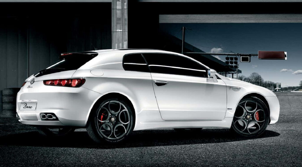 Alfa Romeo Brera silver sports car speeding on urban road sleek design automotive wallpaper background