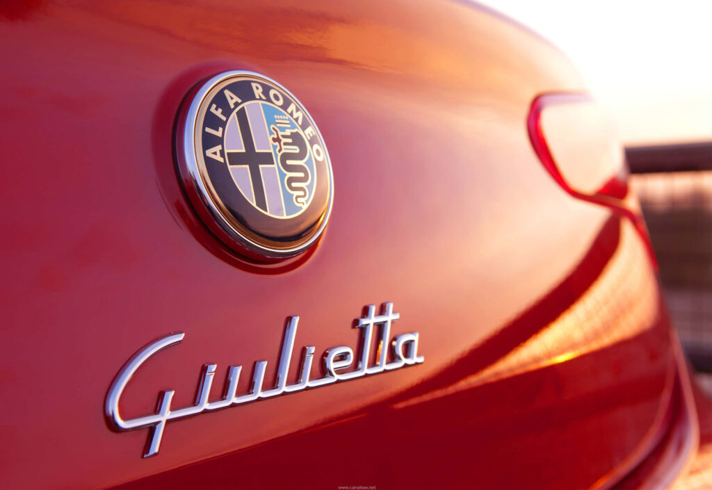 Close-up of Alfa Romeo Giulietta rear showcasing sleek design and iconic badge wallpaper background