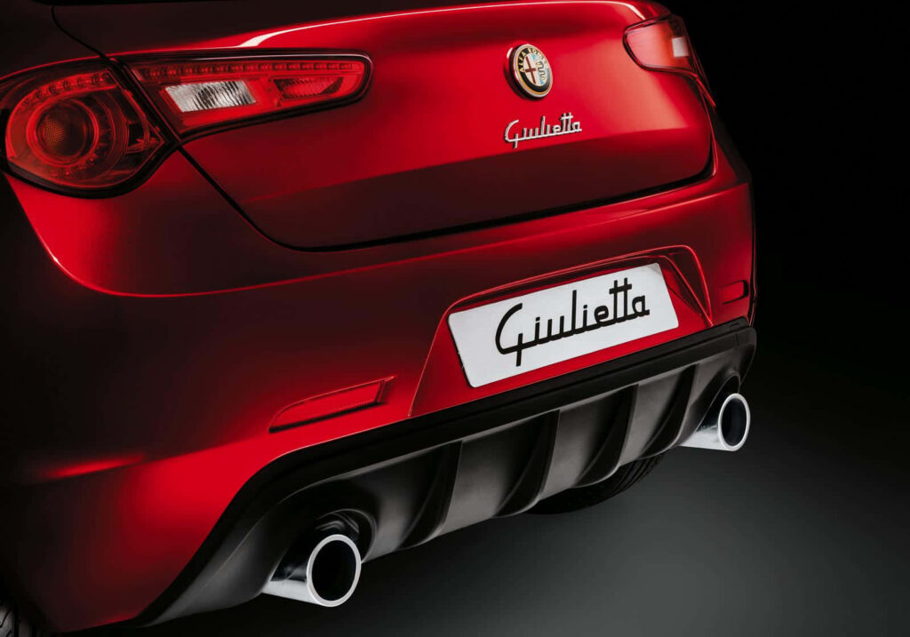 Alfa Romeo Giulietta rear view with sporty tail lights dual exhausts and glossy red finish wallpaper